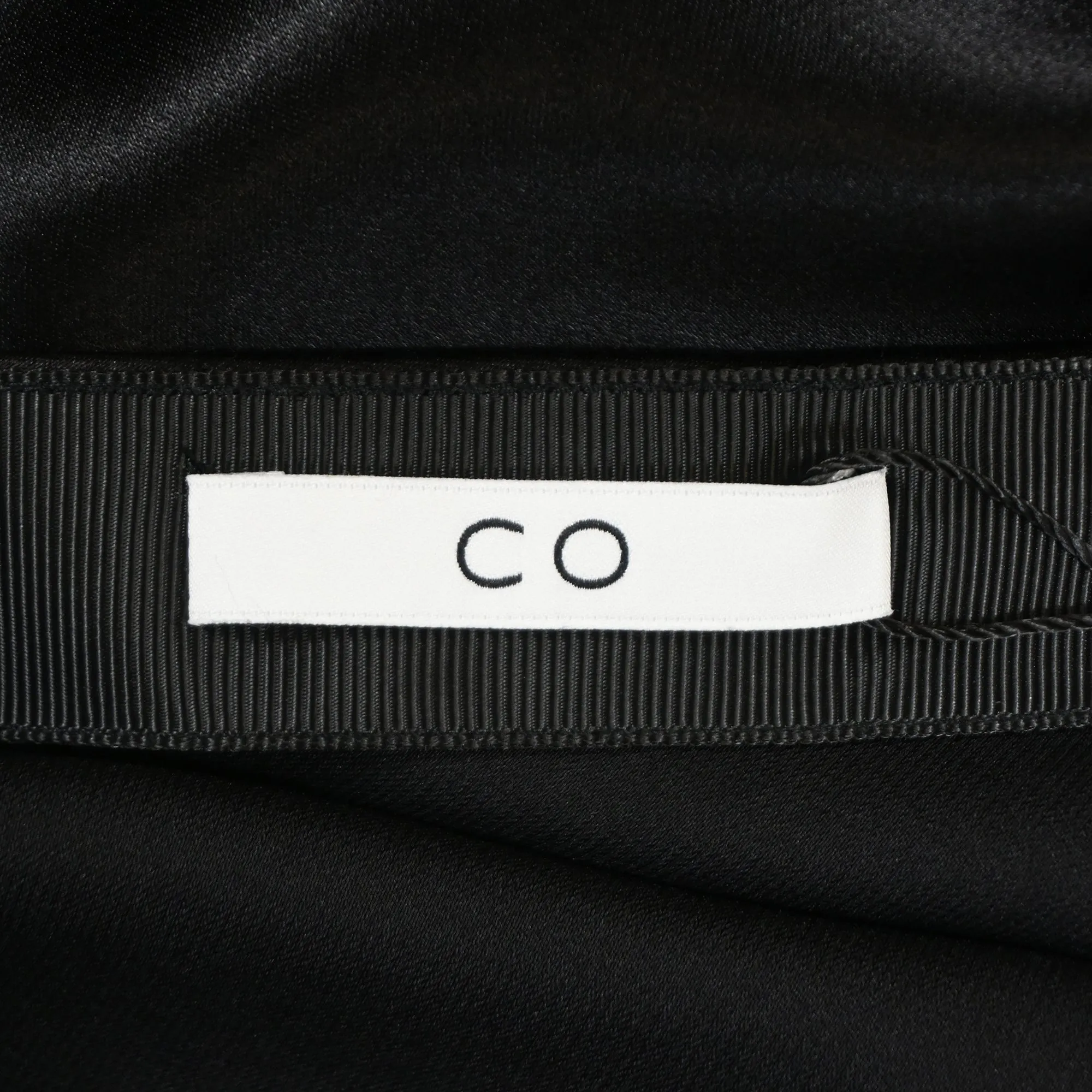 Co High-Waisted Midi Flared Skirt in Black Silk